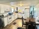 Updated kitchen with white cabinetry, modern appliances, and a bright, open layout at 9790 66Th N St # 346, Pinellas Park, FL 33782