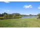 Picturesque lake view highlighting the serene atmosphere of the community at 11414 Juglans Dr, Odessa, FL 33556