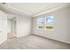 Bedroom featuring carpet, recessed lighting, and bright windows at 12323 Hearts Ease St, Venice, FL 34293