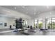 Bright yoga studio with mirrors, mats, and natural light, perfect for wellness activities at 12323 Hearts Ease St, Venice, FL 34293