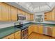 Updated kitchen featuring stainless steel appliances and plenty of cabinet space at 131 Bluff View Dr # 101, Belleair Bluffs, FL 33770