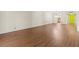 Large living room with hardwood floors and a neutral color palette at 131 Bluff View Dr # 101, Belleair Bluffs, FL 33770