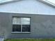 Close up on exterior block wall featuring a window at 1312 Foxboro Dr., Brandon, FL 33511