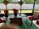 Enclosed patio with tiled flooring and view of the backyard at 1312 Foxboro Dr., Brandon, FL 33511