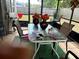 Enclosed patio with tiled flooring and view of the backyard at 1312 Foxboro Dr., Brandon, FL 33511