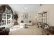 Cozy living room showcasing a large window, comfortable seating, and decorative accents at 15014 Arbor Hollow Dr, Odessa, FL 33556
