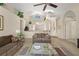 Bright living room featuring high ceilings and an open design for a spacious feel at 15014 Arbor Hollow Dr, Odessa, FL 33556
