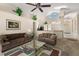Open-concept living area with high ceilings and natural light, ideal for gatherings at 15014 Arbor Hollow Dr, Odessa, FL 33556