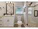 Bright bathroom featuring modern fixtures, a vanity, and a glass-enclosed shower at 1775 Michigan Ne Ave, St Petersburg, FL 33703