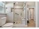 Bathroom showcasing a glass-enclosed shower with built-in seating at 1775 Michigan Ne Ave, St Petersburg, FL 33703