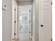 Hallway showcasing the architectural design leading to other rooms at 1775 Michigan Ne Ave, St Petersburg, FL 33703