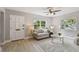 Inviting living room with a neutral color palette, stylish furniture, and plenty of natural light at 1775 Michigan Ne Ave, St Petersburg, FL 33703
