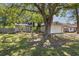 Charming single-story home with a well-maintained lawn and mature shade trees in a peaceful neighborhood at 1849 Diane Dr, Clearwater, FL 33759