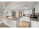 Modern kitchen featuring granite counters, stainless steel appliances, and ample cabinet space at 1849 Diane Dr, Clearwater, FL 33759