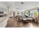 Open-concept living area with a modern kitchen and dining space, perfect for Gathering gatherings and entertaining guests at 1849 Diane Dr, Clearwater, FL 33759