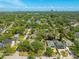 An elevated view of a charming neighborhood nestled among trees with the skyline off in the distance at 2304 S Occident St, Tampa, FL 33629