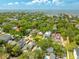 A scenic aerial view of a tree-filled neighborhood near the water, providing peaceful residential living at 2304 S Occident St, Tampa, FL 33629