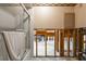 Bathroom showcasing tile work, a bathtub with glass door, and vanity, awaiting renovation at 2304 S Occident St, Tampa, FL 33629