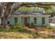 Charming single-story home with a lush front yard and inviting brick walkway at 2304 S Occident St, Tampa, FL 33629