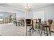 Spacious living room featuring large windows, neutral walls, and a transitional design aesthetic at 2304 S Occident St, Tampa, FL 33629