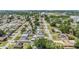 An aerial view of the neighborhood with a view of Raymond James Stadium in the distance at 2808 W Lake Ave, Tampa, FL 33607