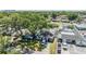 An aerial view of the property showing the front yard, covered parking, and neighborhood at 2808 W Lake Ave, Tampa, FL 33607