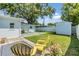 Inviting backyard with lawn and patio area at 2808 W Lake Ave, Tampa, FL 33607