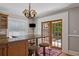 Open kitchen design with granite countertops, stainless appliance and access to patio at 307 Bay St, Tarpon Springs, FL 34689