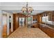 Spacious kitchen with granite countertops, stainless appliances, and custom cabinetry at 307 Bay St, Tarpon Springs, FL 34689