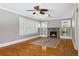 Spacious living room with fireplace and hardwood flooring at 307 Bay St, Tarpon Springs, FL 34689