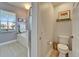 Bathroom featuring a soaking tub and tile flooring at 308 Manns Harbor Dr, Apollo Beach, FL 33572