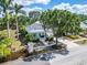Lovely single-Gathering home with a welcoming front porch and a lush, green yard at 308 Manns Harbor Dr, Apollo Beach, FL 33572