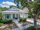 Inviting single-Gathering home with a cozy front porch and an attached two-car garage at 308 Manns Harbor Dr, Apollo Beach, FL 33572