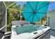 Inviting hot tub on the screened patio, perfect for relaxation and enjoying the outdoors at 308 Manns Harbor Dr, Apollo Beach, FL 33572