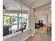Through the window, discover a relaxing outdoor patio area, perfect for entertaining and relaxing at 308 Manns Harbor Dr, Apollo Beach, FL 33572