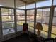 Relaxing sunroom with large windows offering ample natural light at 3114 Briar St. St, Wesley Chapel, FL 33543