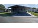Charming home with a covered parking area and well-maintained landscaping at 3114 Briar St. St, Wesley Chapel, FL 33543