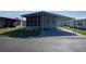 Inviting home with covered parking and neat landscaping at 3114 Briar St. St, Wesley Chapel, FL 33543