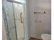 Bathroom shower with safety grab bars and a sliding door for easy access and safety at 3114 Briar St. St, Wesley Chapel, FL 33543