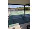 Community shuffleboard courts with lake views and seating at 3114 Briar St. St, Wesley Chapel, FL 33543