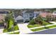 Beautiful two-story home with lush landscaping and a spacious driveway at 32203 Wenlock Loop, Wesley Chapel, FL 33543