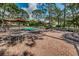 Relaxing pool area with tables, chairs, umbrellas, and a pristine pool, perfect for leisure at 36750 Us 19 N Hwy # 18-210, Palm Harbor, FL 34684
