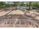Brick patio with tables and chairs overlooking the pool, offering a great space for relaxation at 36750 Us 19 N Hwy # 18-210, Palm Harbor, FL 34684