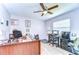 Functional office or bedroom with desk, shelving, and ample space for work or relaxation at 4110 Summerdale Dr, Tampa, FL 33624
