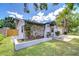 Charming house with stone accents and well-maintained lawn and garden at 4110 Summerdale Dr, Tampa, FL 33624