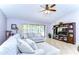 Comfortable living room featuring a plush sectional sofa and a built-in entertainment center at 4110 Summerdale Dr, Tampa, FL 33624
