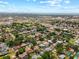 Broad aerial view pinpointing the property within a well-established neighborhood near commercial areas and roadways at 6470 28Th N Ter, St Petersburg, FL 33710