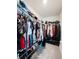 Spacious walk-in closet with ample storage and organization options for clothes, shoes, and accessories at 659 Sunlit Coral St, Ruskin, FL 33570