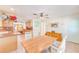 Well-lit dining room offering ample space and easy access to the kitchen at 700 16Th Nw St, Largo, FL 33770