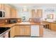 Functional kitchen featuring sleek appliances and tiled countertops for cooking convenience at 700 16Th Nw St, Largo, FL 33770